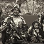 Javier and Michael ride in the parade